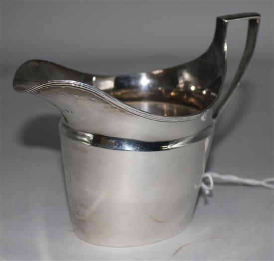 A George III silver cream jug.